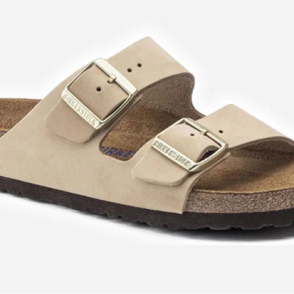 A classic double buckle sandal with a nubuck leather upper and soft footbed